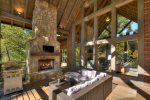 Creekside Bend - Outdoor fireplace and seating 